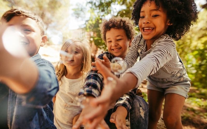 Kids enjoying summer camp activities